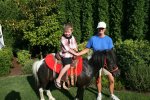 Berkeley riding a pony