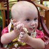 Olivia eating cake.