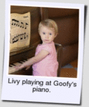 Livy playing at Goofy's piano.
