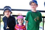 The kids showing off their new necklaces.