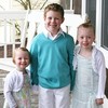 The kids modeling their new Easter Sunday outfits.