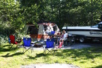 Kristy and Eliana sitting at camp.
