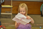 Eliana opening presents from her cousins (1 of 3).